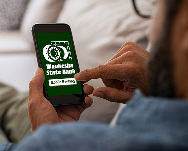 man using WSB mobile banking app