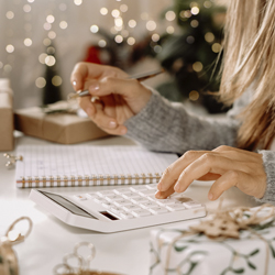 girl calculating gift costs