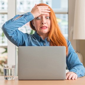 woman frustrated at computer