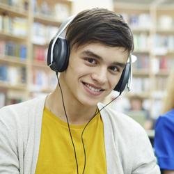 student studying with headphones
