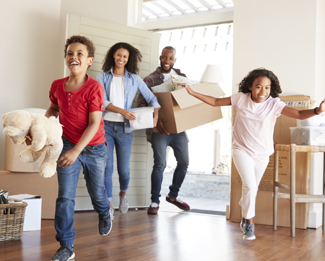 family running into new home