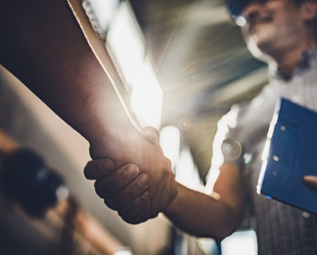 Close up of a handshake.