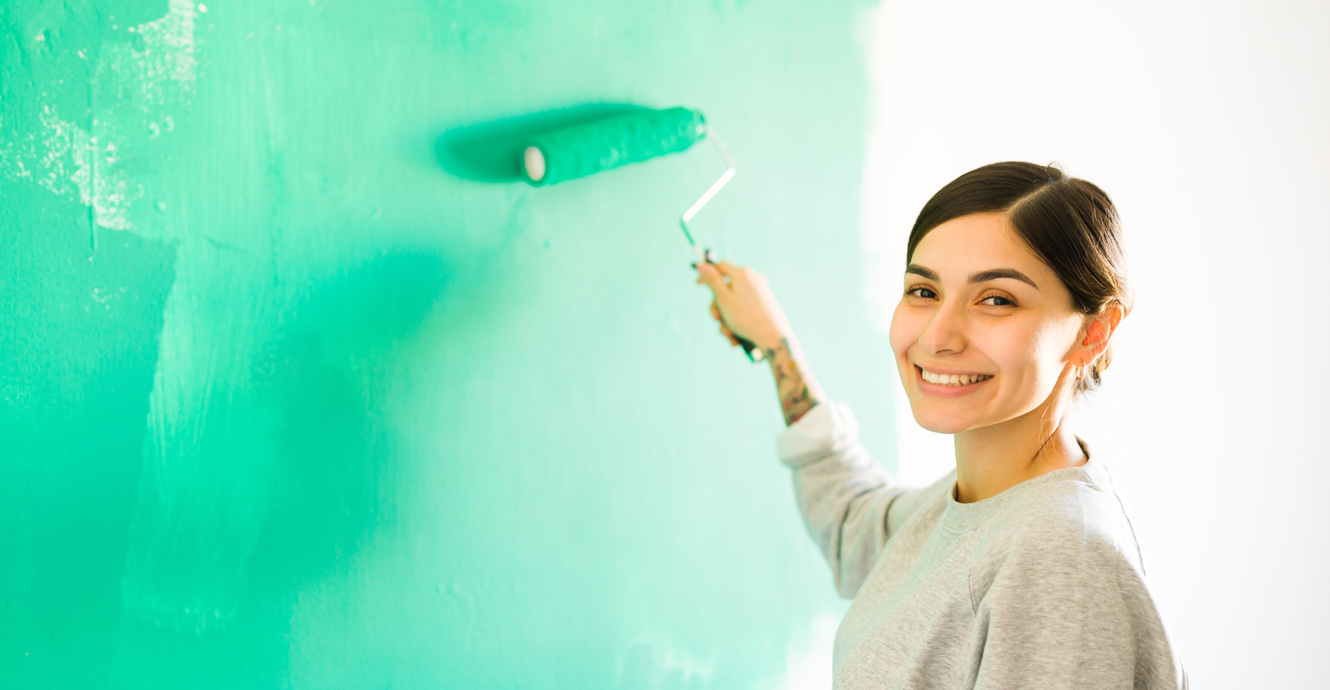 woman painting home