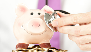 doctor with piggy bank