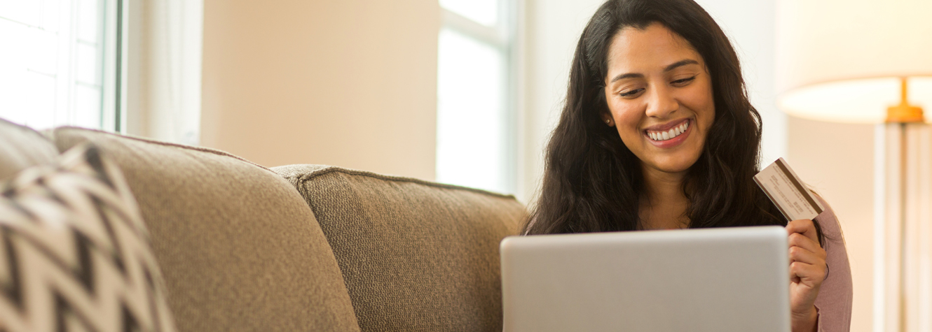 Hispanic woman shopping online