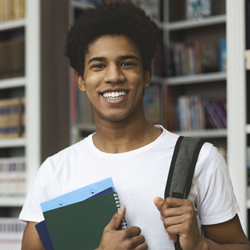 college guy in library