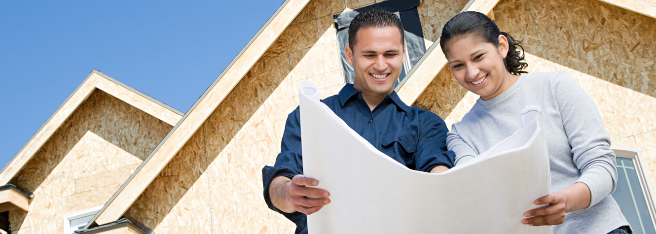 couple with house blueprints