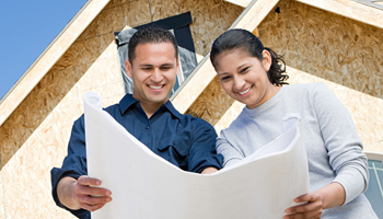 couple with house blueprints