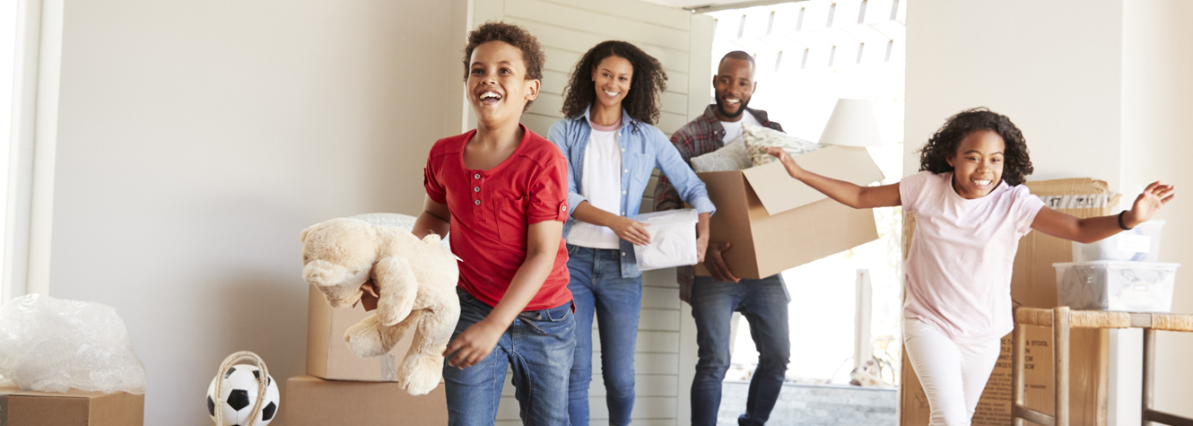 family running into new home